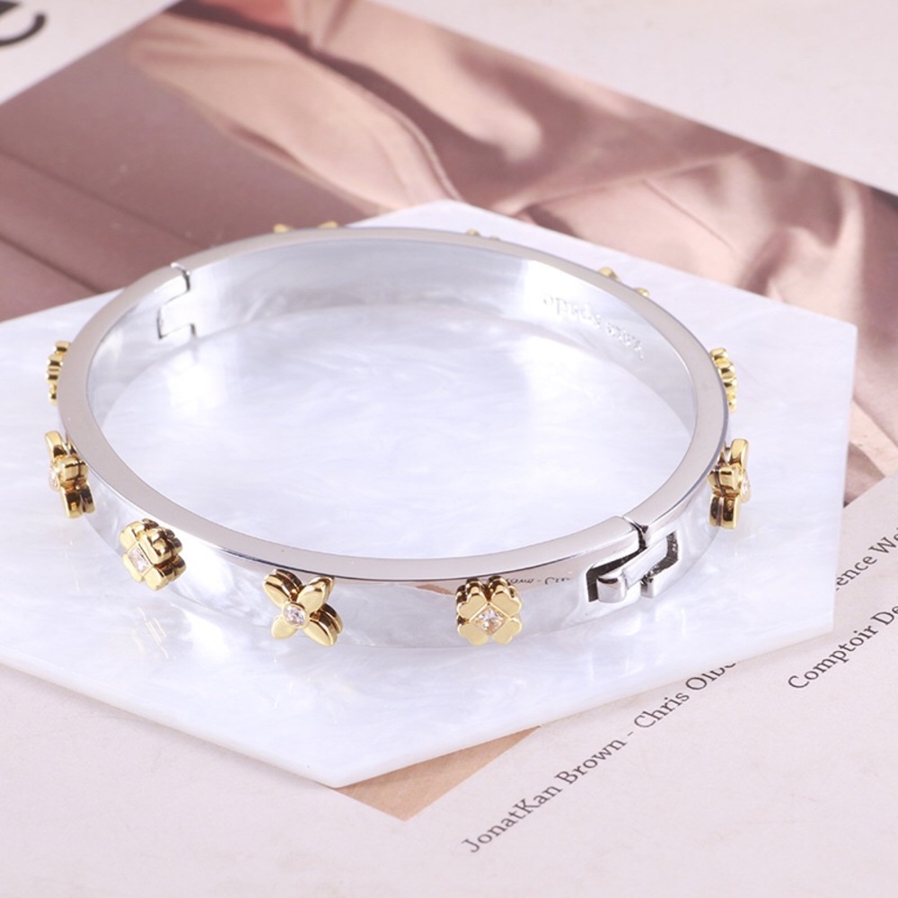 Kate Spade Gold-Plated Metal Clover Bangle with Sparkling Crystals